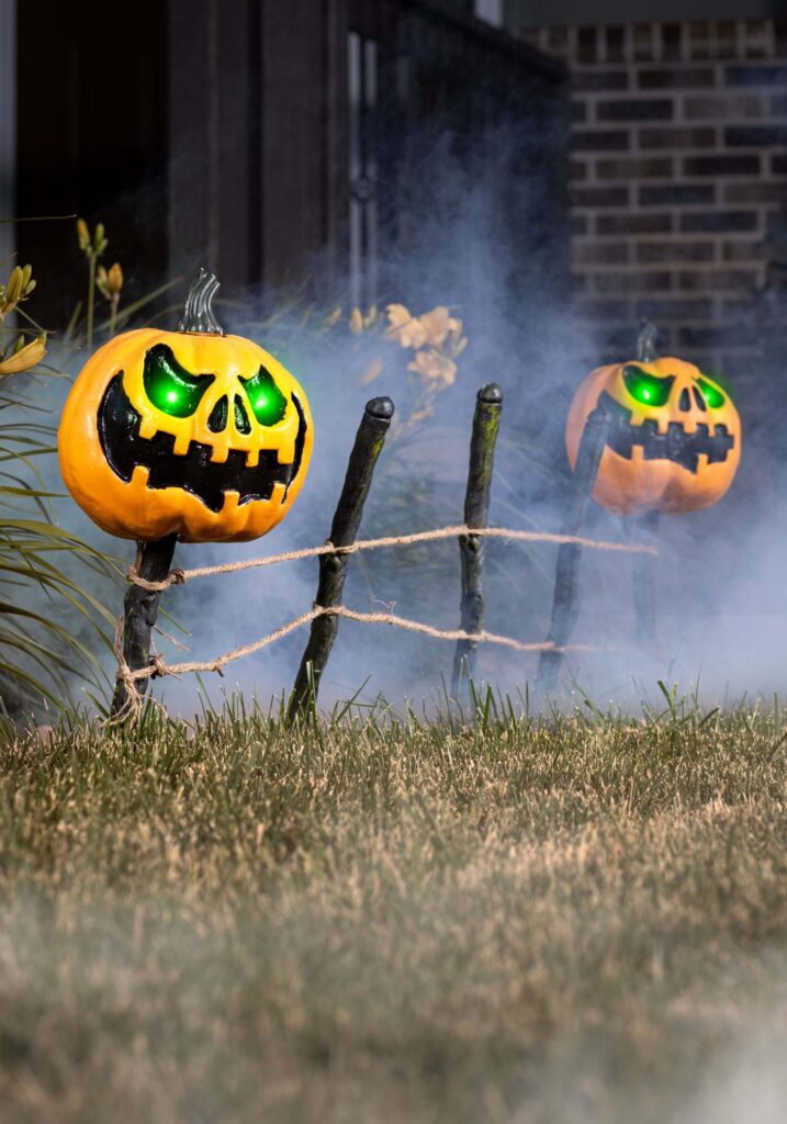 Pumpkin Fence with Halloween Yard Stake Decorations - Green Light Halloween Decoration