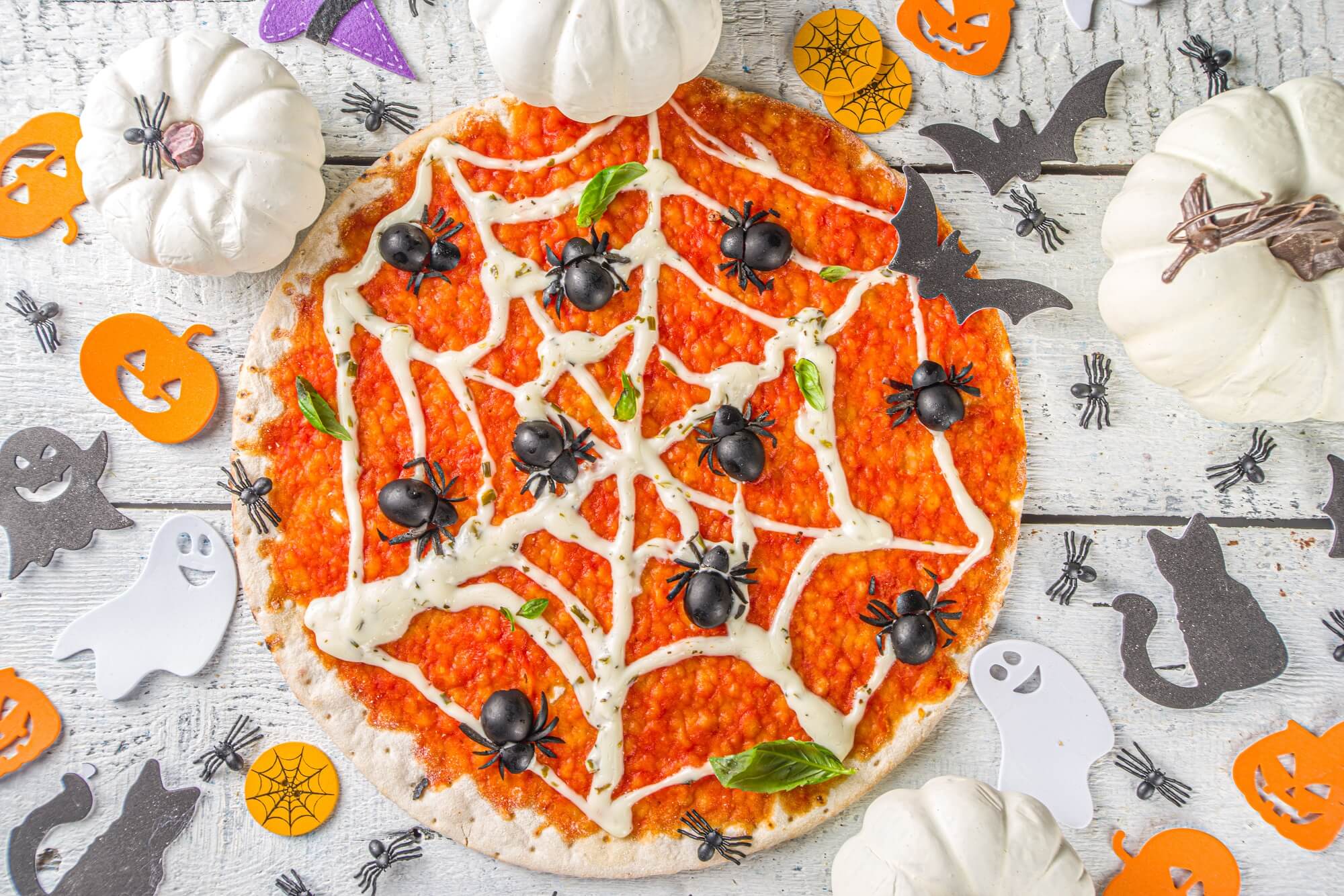 Halloween Pizza Ideas - Saucy Spiderweb Pizza - Halloween Party Food Ideas