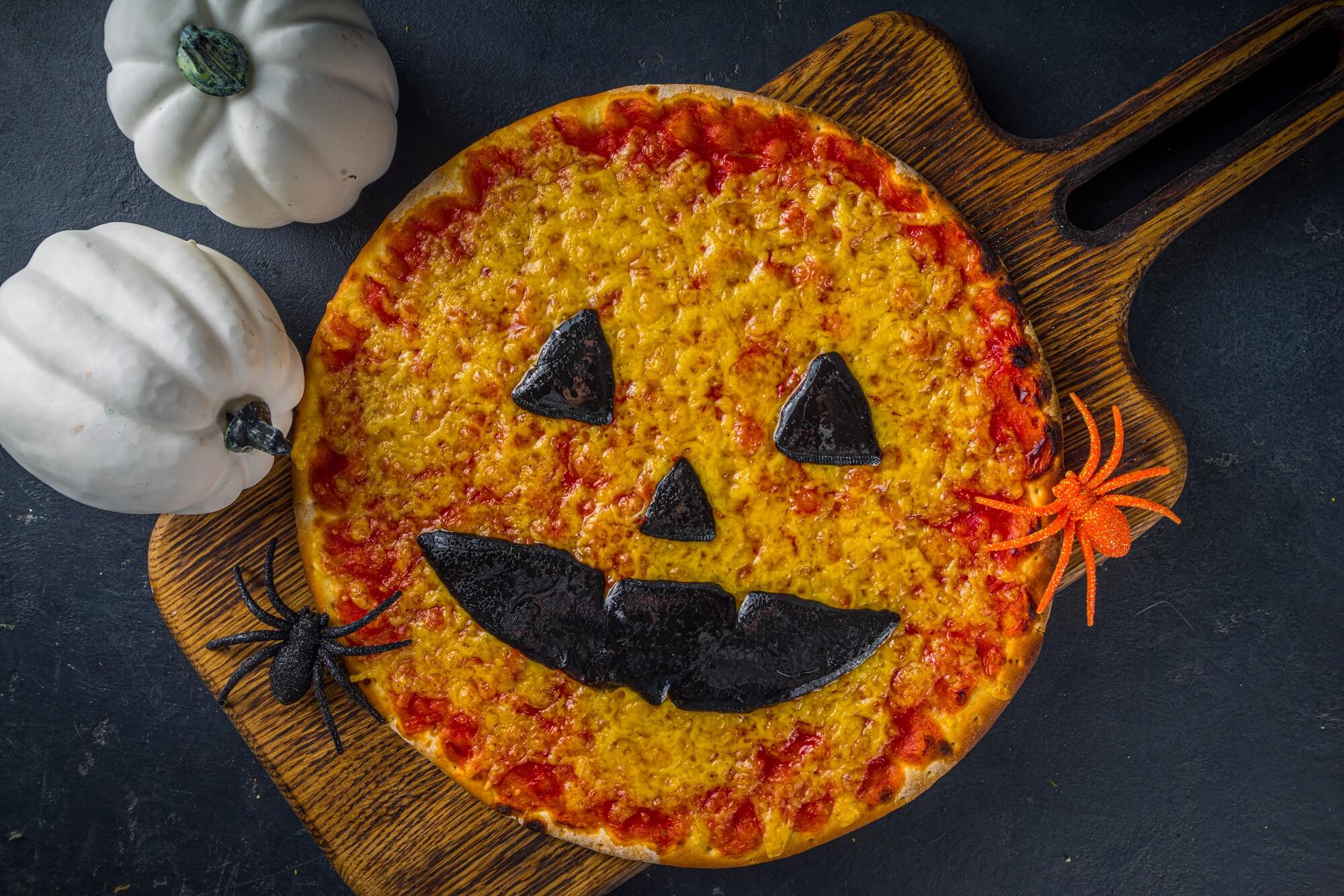 Halloween Pizza Ideas for the Spooky Season - Jack O Lantern Pizza Pumpkin Face