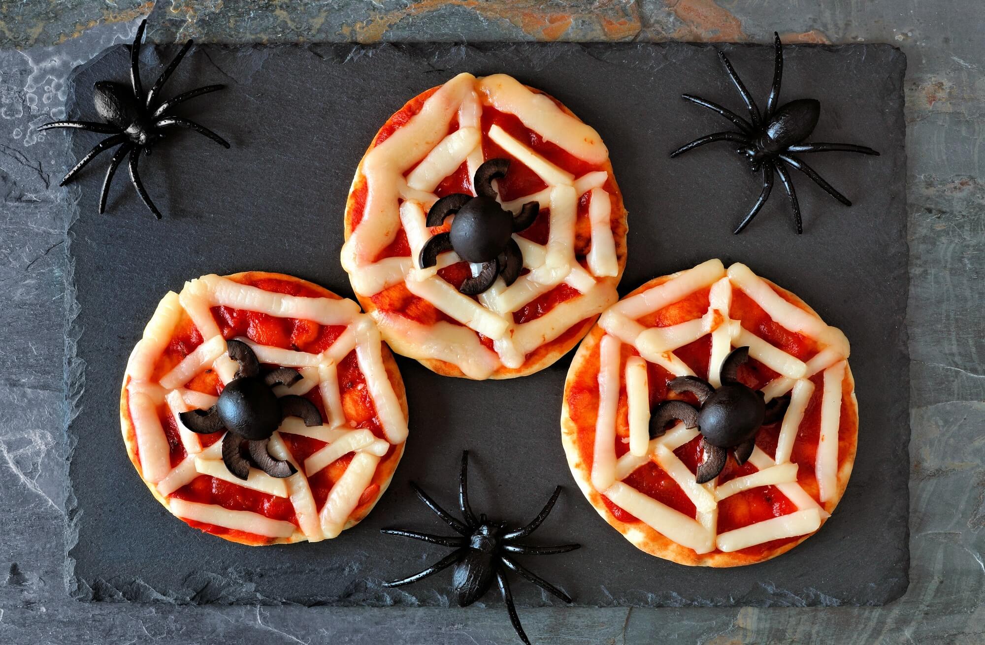 Halloween Pizza Ideas for the Spooky Season - Olive & Cheese Spider & Spiderweb Halloween Mini Pizzas