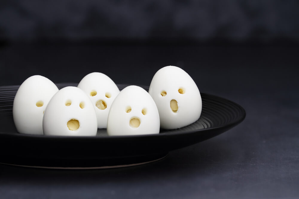 Spooky Eggs Ghosts - Halloween Eggs Spooky Breakfast & Party Food Ideas - Mad Halloween