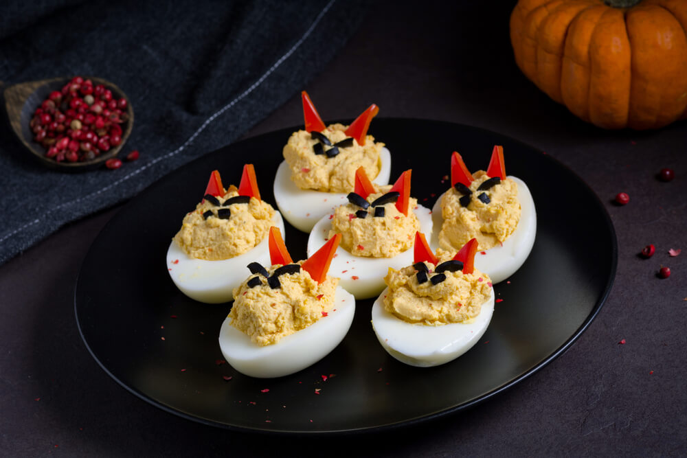 Deviled Eggs Pepper Horns Olive Eyes Halloween Eggs Spooky Breakfast & Party Food Ideas - Mad Halloween
