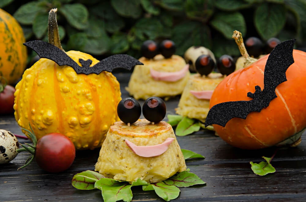 Halloween Monster Quiche with Olive Eyes and Ham Tongue - Halloween Eggs Spooky Breakfast & Party Food Ideas - Mad Halloween